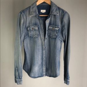Distressed denim button up shirt